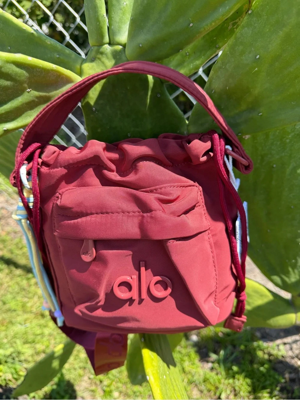 ALO Yoga Burgundy  Drawstring Mini Bucket Bag with Multicolor Cord Tassels